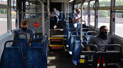 Socially distanced passengers on a Metro Transit bus