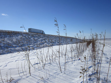 snow field with semi truck