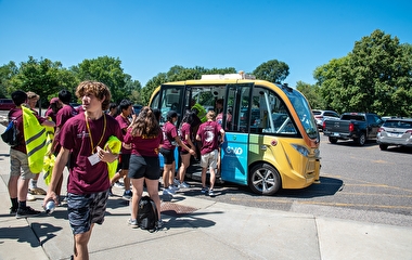 CAV campers boarding the Bear Tracks automated shuttle