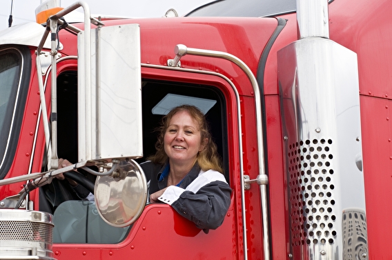 Woman driving a semi truck