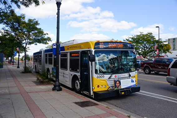 Metro Transit bus destined for downtown Minneapolis stopped at a bus stop