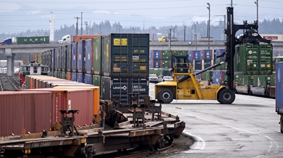A freight train being loaded at the Port of Seattle