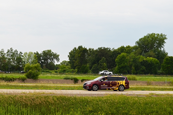 MnCAV vehicle driving on the MnROAD test track