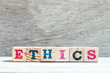Wooden blocks spelling the word "ethics"