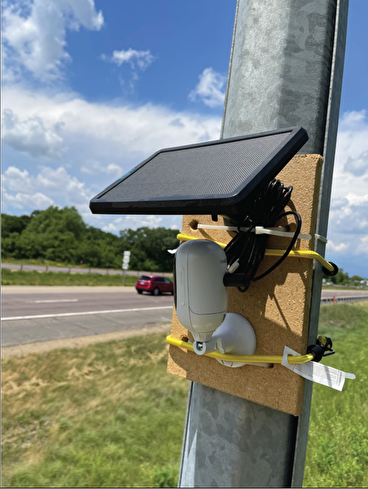 Video data collection system mounted on a roadside pole