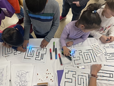 Kids experimenting with Ozobots at Tech Fest