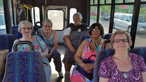 Older adult women on a bus